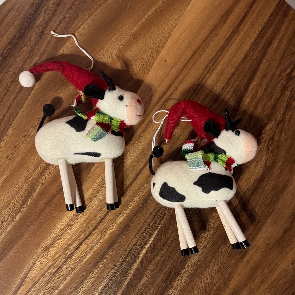 Festive Cow Ornaments with Red Santa Hats